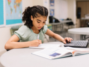 Student at desk studying